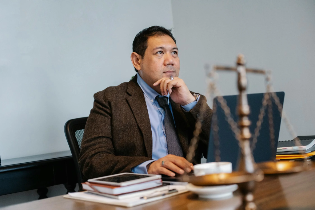 A legal expert in their office.