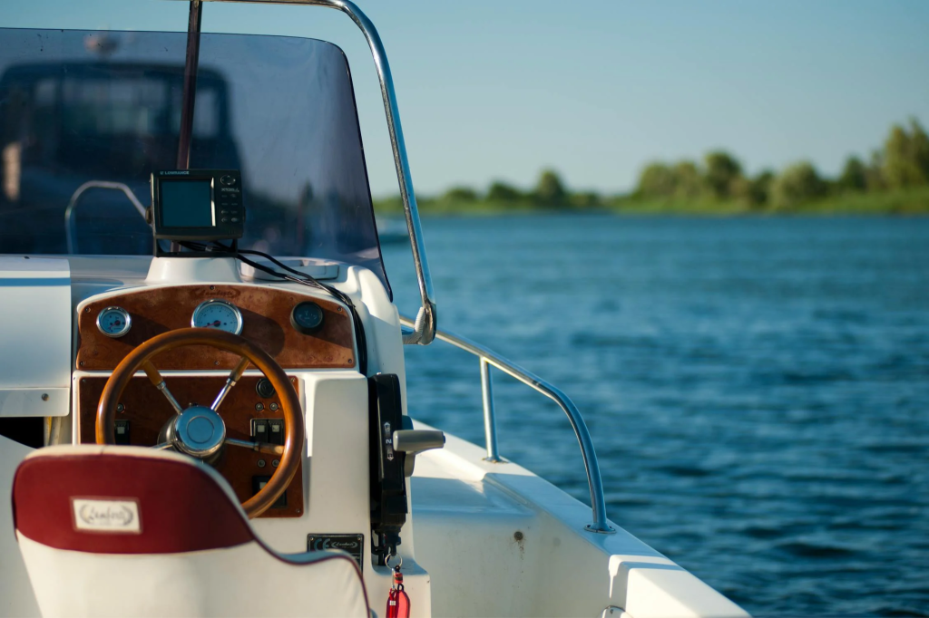 A commercial boat sailing on water.